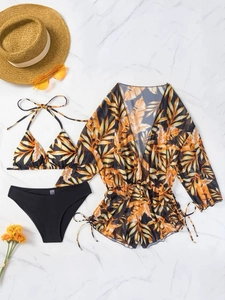Three-piece bikini set with orange tropical palm leaf print and black mesh cover-up
