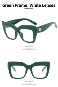 Detail view of dark green cat-eye glasses frame with golden metal hinge accents