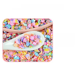 Macro shot of 5mm colorful dessert-themed polymer clay slices for DIY craft and nail art
