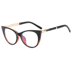 Classic cat-eye eyeglasses with black and tortoiseshell frames and gold metal temples