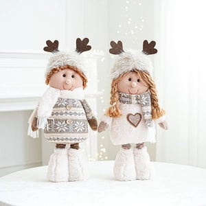 Christmas plush doll pair with knit sweaters and reindeer horns for holiday table decor