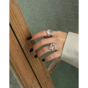 Minimalist S925 sterling silver chain and twisted knot rings for women on hand