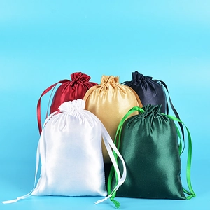 Satin drawstring gift bags in red, gold, black, white, and green with silky finish