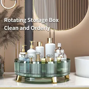 Rotating emerald green makeup organizer with vertical texture and gold support legs