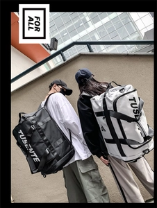 Waterproof travel bag with bold letter print showing multiple carrying modes for sports