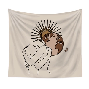 Detail of bohemian wall tapestry featuring abstract line art of hugging couple and celestial sun