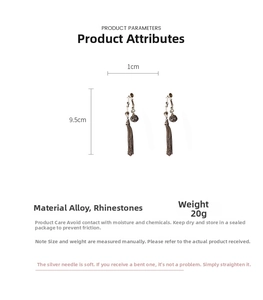 Detail view of vintage long tassel earrings with size 1cm by 9.5cm and material specs