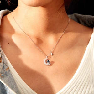 S925 sterling silver astronaut on moon necklace with blue gemstone and white zircon