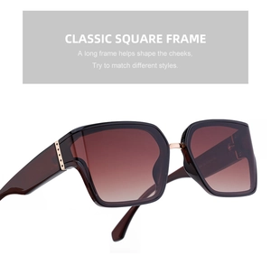 Detail view of square fashion sunglasses featuring brown gradient lenses and premium frame