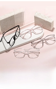 Selection of large-frame glasses in black, pink, and transparent colors for a modern look