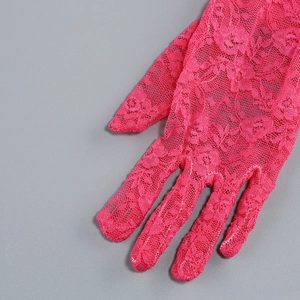 Detailed view of rose pink floral lace gloves with intricate mesh and scallop edge