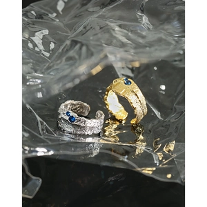 Irregular textured S925 silver rings with blue zircon in gold and silver finishes