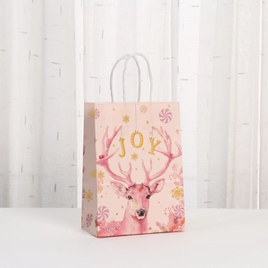 Detailed view of pink gift bag with reindeer illustration and white rope handle
