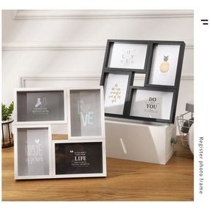 Detail of creative geometric photo frame in black and white finish for wall display