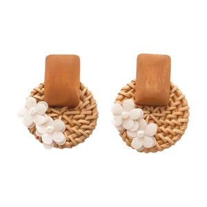 Handmade bohemian rattan flower stud earrings with white fabric petals and pearls