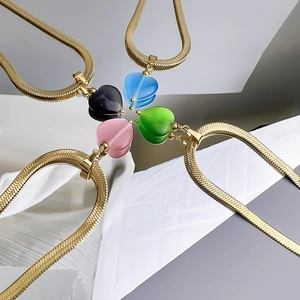 Flat blade gold chain necklaces featuring heart cat-eye opal pendants in four vibrant colors