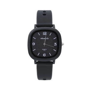 Detailed view of square black watch face with grid design and silicone strap