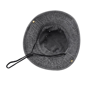 Foldable washed cotton bucket hat in charcoal grey with adjustable chin strap and side snaps