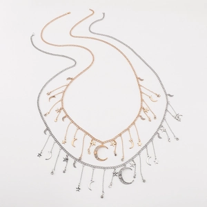 Star and moon fringe necklace with rhinestones and pearls in a heart shape layout