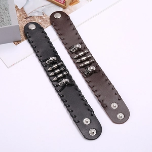 Punk leather bracelets in black and brown with metal skull and bullet stud accents