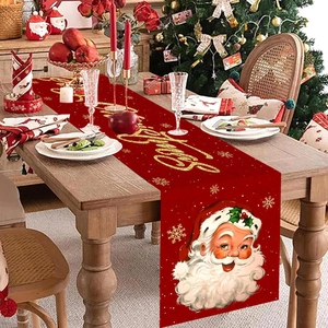 Festive red Merry Christmas table runner with Santa Claus and gold glitter patterns