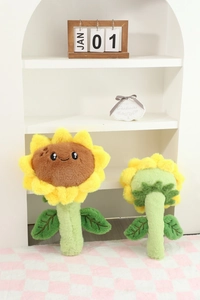 Détails des coussins peluche tournesol avec expressions mignonnes et pétales doux
