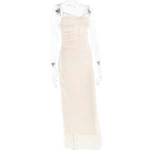 Detail of slim fit beige mesh long dress with lace panels on transparent mannequin