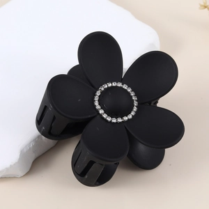 Chic matte black flower shark hair claw clip with rhinestones for elegant styling