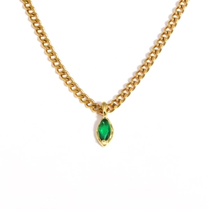 Gold stainless steel necklace with marquise green stone pendant on white background