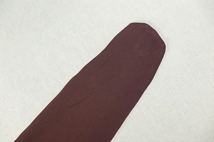 Close-up of coffee brown seamless toe detail on high-elasticity knitted tights