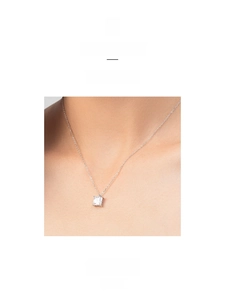 Close-up of S925 sterling silver necklace featuring a square-cut sparkling pendant