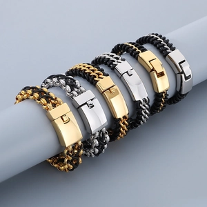 Macro detail of men's woven leather bracelets with polished gold and silver steel clasps