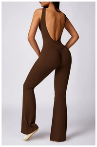 Detail of backless yoga jumpsuit with ruched butt lift design and flared leg in dark brown