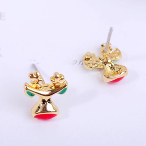 Detail of reindeer stud earrings with gold plating and red nose festive enamel accents