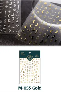 Detail of vintage gold nail stickers M-055 featuring celestial moon and star patterns