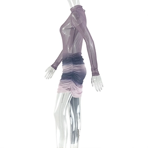 Detail of purple gradient mesh mini dress showing sheer long sleeves and side ruching