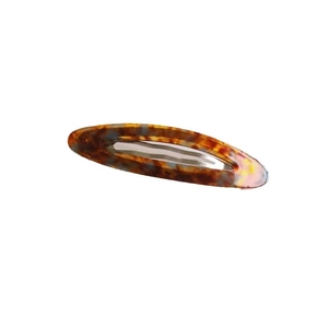 Fermaglio per capelli ovale in acetato tartarugato con etichetta dorata e clip