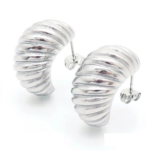 Polished silver croissant hoop earrings with textured spiral ridges on white background