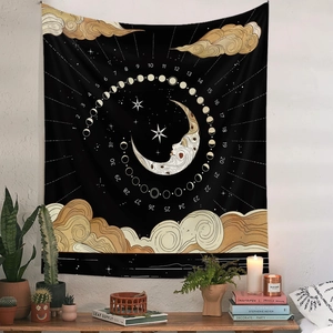 Detail of celestial tapestry featuring golden moon phases and stars on white wall decor