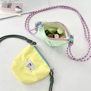 Minimalist crossbody phone bags showing interior storage for lipstick and cosmetics