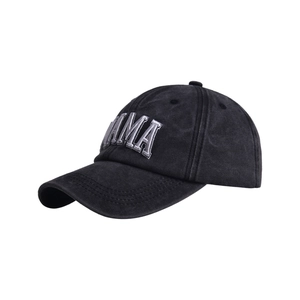 Close-up of black washed cotton baseball cap featuring silver 3D MAMA embroidery texture