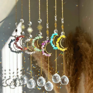 Set of 7 hanging moon suncatchers with various colored crushed crystals and metal frames