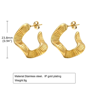 Detail view of twisted gold hoop earrings with dimensions and material specifications