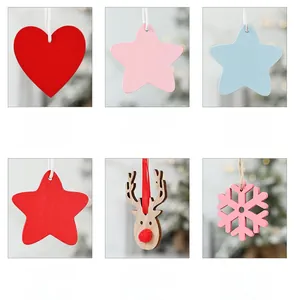 Detailed view of wooden Christmas ornaments including stars, hearts, and snowflakes