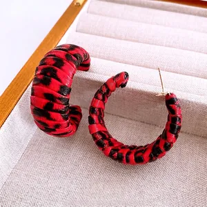 Retro C-shaped hoop earrings with leopard print leather wrap and golden metal pins