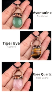 Detail of natural stone pendants in aventurine, tiger eye, and rose quartz with bronze caps