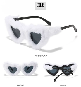Three-way view of heart-shaped sunglasses with white plush fur and black frames