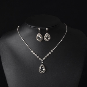 Elegant silver bridal jewelry set featuring waterdrop crystal necklace and drop earrings