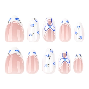 Blueberry almond press-on nails with white French tips and delicate bow accents