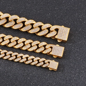 Comparison of three widths of gold Cuban link chains with iced-out pave rhinestones